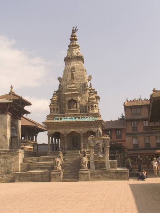 BHAKTAPUR NEPAL November Looking across Durbar Square to Vatasala Shikara - dedicated to Vatasala a terrifying female deity- built late 17thc as  5 temple tower in North Indian style