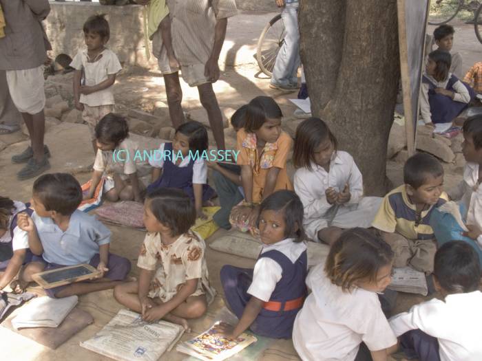 SANIA MADHYA PRADESH INDIA November School children having their lessons out of doors at the village Junior School