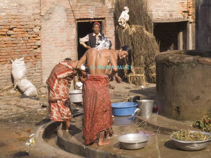 KHOKANI NEPAL November Some of the villagers washing at the village well in this Newar farming village in the Kathmandu Valley. Only married women show their breasts in public