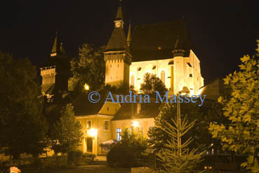 Biertan Transylvania Romania Europe September View to the fortified medieval church lit up at night