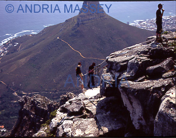 CAPE TOWN SOUTH AFRICA
Abseiling from the top of Cable Mountain - Lion's Head in the background