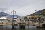 QUEENSTOWN SOUTHERN LAKES SOUTH ISLAND NEW ZEALAND May Moored motorboats and yachts at Steamer Quay on Lake Wakatipu of this charming small town