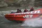 ARTHURS POINT QUEENSTOWN SOUTHERN LAKES SOUTH ISLAND NEW ZEALAND May The Shotover Jet Boat screams past taking tourists on a thrilling ride along the Shotover River Canyon