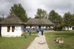 Bran Transylvania Romania EU September Visitors to the Village Museum viewing the traditional 19thc buildings dating to the 19thc