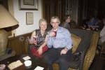 SINGAPORE CITY ASIA May A male and female visitor drinking an Singapore sling in the Long Bar of Raffles Hotel