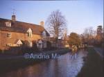 Lower Slaughter Gloucestershire -Looking up the main street - late evening  sun

Format: Medium
