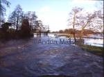 Sutton Green Surrey - River Wet Navigational meets River Wey at Craft Lock - river in full  flood

Format: Medium