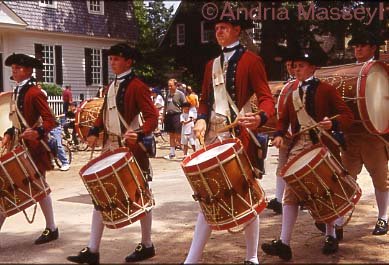 18th century band marching down Gloucester St Williamsburg USA

Format: 35mm